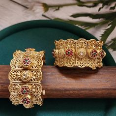 This pair of Indian bangles are perfect blend of modern luxury and traditional style. These bangles are beautifully handcrafted with utmost precision and skill. Our designers have spent hours on this piece to meet your special occasion needs. It is perfect choice for brides, pair this with your rest of the jewelry for a complete royal look. Details & Specifications: Openable kada fits 2 '4 to 2 '8 Bangle Bracelets As Diwali Gifts, Gold-plated Bangle Cuff Bracelet For Wedding, Gold Toe Ring Jewelry For Diwali, Traditional Ceremonial Bangle Jewelry, Ceremonial Toe Ring For Diwali, Elegant Gold-plated Bracelet For Festivals, Festive Fusion Metal Bracelets, Gold Plated Bangle Bracelet For Wedding, Traditional Bangle Cuff Bracelet Gift