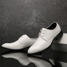 Look stylish in these men's lace up White tuxedo dress shoes. Crafted from genuine leather, these shoes boast a classic design with a comfortable fit and cushioning for all-day wear. A perfect formal accompaniment for any tuxedo. Patent leather Heel measures approximately 1" Lightweight and flexible rubber outsole White Tuxedo Dress, White Dress Shoes Men, Official Shoes, Black Tie Optional, Mens Derby Shoes, Men's Wedding Shoes, Shoes Elegant, White Dress Shoes, White Tuxedo