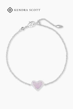 Wear your heart on your wrist with the Ari Heart Silver Chain Bracelet in Amethyst. This asymmetrical design shines solo, but functions just as well as part of your everyday stack. Adjustable Heart Pendant Bracelets For Everyday, Adjustable Everyday Heart Pendant Bracelet, Trendy Sterling Silver Heart Bracelet, Trendy Adjustable Heart Chain Bracelet, Modern Adjustable Jewelry For Valentine's Day, Heart-shaped Everyday Bracelets With Adjustable Chain, Heart-shaped Bracelet With Adjustable Chain For Everyday, Everyday Heart Shaped Bracelet With Adjustable Chain, Everyday Heart-shaped Bracelet With Adjustable Chain