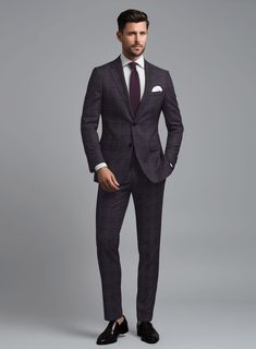 If you're seeking a new addition to your tailoring collection, consider our exquisite Loro Piana Marcelo Wool Silk Linen Suit. Crafted meticulously from a blend of wool, silk, and linen fabric, this suit features a captivating check pattern with vibrant purple hues, accentuating the elegant cloth. This sartorial masterpiece is ideal for weddings, semi-formal gatherings, or making a bold statement at the office.  A marriage of elegance and comfort, Loro Piana fabrics are made using the highest quality raw materials in the world, in their purest form or blended together. A sophisticated response to the dictates of contemporary elegance, these fabrics lend themselves to a wide range of styles to meet the varied needs of today’s wardrobe, from daywear to formal suits, from blazers to fancy jac Luxury Linen Tweed Jacket For Business, Luxury Linen Business Tweed Jacket, Silk Notch Lapel Formal Sets, Tailored Silk Sets With Notch Lapel, Bespoke Tailored Silk Suits, Elegant Business Suit In Suiting Fabric, Silk Three-piece Suit With Suit Collar, Elegant Linen Tweed Jacket For Work, Elegant Unstitched Business Suit