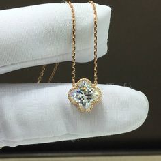 This is made-to-order item, it takes about 3-4 weeks to deliver your pendant necklace after order is placed, thank you. Lab created Moissanite diamond is setting in 18K solid white gold, rose gold or yellow gold chain. Moissanite pendant necklace. Moissanite diamond: -Color: D (colorless); -Clarity: VVS1 (very very slightly included); -Cut: truly clover; -Weight: 1.0 carat, 6x6 mm; Total weight of the necklace is about 1.9 grams. Video link: https://www.instagram.com/tv/CYrFq3DhG1Z/?utm_medium=c Luxury Solitaire Pendant Necklace For Anniversary, Classic Rose Gold Moissanite Necklace, Moissanite Diamond Cut Pendant Necklace, Moissanite Pendant Necklace With Diamond Cut, Luxury Diamond Cut Flower Pendant Necklace, Luxury Diamond Clavicle Chain Necklace For Gift, Luxury Rose Gold Flower Pendant Necklace, Luxury Flower Pendant Jewelry For Anniversary, Luxury Moissanite Round Pendant Necklace