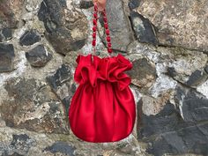 🔘 This Elegant Satin Ruffle bag is ideal for the wedding day, night out, party, special occasion, brides, bridesmaids, mothers of the bride, or any formal fun. 🔘 This bag has an elastic opening and a stiff bottom.   🔘 Please contact us for a custom order. 🔘 Material: Satin fabric, lace. The lining fabric is the same fabric as on the outside.  🔘 Measurements: The bottom diameter is 15 cm/6 inches & Height is 19 cm /7.5 inches 🔘 Care instruction: Hand wash in Luke water. Valentine's Day Evening Handheld Shoulder Bag, Red Clutch Pouch For Evening, Red Handheld Bag For Events, Elegant Red Evening Pouch, Elegant Bags With Removable Pouch For Valentine's Day, Red Clutch Pouch For Formal Occasions, Red Formal Clutch Pouch, Formal Red Clutch Pouch, Red Clutch Shoulder Bag For Events