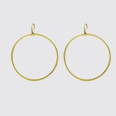 Large hoop earrings hang from an ear wire , swingy, modern, plain and sleek -approx.- 2" diameter-french ear wire-EJ2050 Large Hoop Earrings, Ear Wire, Gold Plate, Hoop Earrings, Sleek, Sterling Silver, Silver, Gold