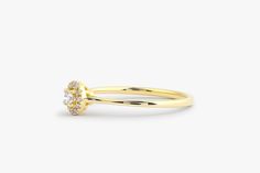 "Diamond Ring / 14k Halo Diamond Ring / Minimal Diamond Ring / Delicate Diamond Ring / Promise Ring / Birthday Gift Idea / Gold Ring Features * Made to Order. * Gold Kt: 14K Solid Gold * Custom Gold Color: Rose Gold, Yellow Gold, White Gold * Round Diamond: 12 pcs pc 1.00 MM * Round Diamond: 1 pcs 2.50 MM * Total Number of Stones: 13 * Total CTW: 0.12 Ctw * Diamond Color Clarity: G Color Si1 Clarity * Setting Type: Prong / Micro Pave * Length& Width: 4.75 X 4.75MM * Band Width: 1.25MM * Read Yellow Gold Round Cut Halo Cluster Ring, Gold Diamond Ring With Halo And Round Band, Yellow Gold Cluster Ring With Halo And Round Cut, Formal 14k Gold Stackable Rings With Halo Design, Heirloom Yellow Gold Cluster Ring With Halo Design, Heirloom Yellow Gold Cluster Ring With Halo, Gold Halo Birthstone Promise Ring, Gold Halo Diamond Ring Fine Jewelry, Gold Birthstone Halo Ring For Promise