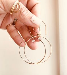 Just as effortless as they are simple, these hoop earrings are an essential everyday piece. Item Details: • This listing is for A PAIR ( 2 pieces ) earrings.• All metal is components are sterling silver and 14k gold-fill• Hoops measure 40mm in diameter.• Herkimer quartz crystals prized, each Herkimer diamond is a natural entity and no stone is identical.• The order will arrive in a gift-wrapped box and free polishing cloth. It will be ready for gift giving. All our work is custom-made by hand in Everyday Circle Jewelry Tarnish Resistant, Everyday Tarnish-resistant Jewelry, Minimalist Everyday Hoop Jewelry, Delicate Everyday Hoop Jewelry, Hypoallergenic Small Hoop Earrings In 14k Gold Filled, Simple Design 14k Gold Earrings, Everyday Rose Gold 14k Hoop Earrings, Dainty Small Hoop Everyday Jewelry, Dainty Hoop Jewelry For Everyday