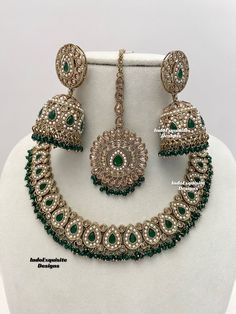 Premium quality antique gold Polki Necklace Set comes with elegant Jhumki earrings and tikka / Indian Jewelry/ High Quality Kundan and Polki Jewelry/ Bollywood Jewelry/Wedding Jewelry/green  All items are shipped from Brampton, Ontario, Canada. If you need your item by a certain day, please reach out to us for express delivery option before placing the order so that we can update the shipping for you. Standard shipping/delivery timeline Below are the delivery timeline estimates once the order ia Traditional Green Hand Set Jewelry Sets, Green Hand Set Round Chandbalis, Traditional Green Hand Set Jewelry, Festive Green Jhumkas With Intricate Design, Green Bridal Necklace With Stone Work, Festive Green Emerald Jewelry Sets, Green Round Kundan Necklace In Temple Jewelry Style, Green Hand-set Round Kundan Necklace, Green Kundan Necklace For Wedding