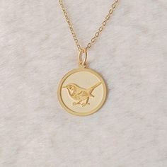 Gold Wren Bird Pendant - Bird Gold Necklace ● Material of pendant: Solid Gold 14k ( REAL GOLD ) ● Metal Stamp: 14k ( REAL GOLD ) ● The pendant is available in 5 sizes: - 12,7 mm / 0.5 inches (Diameter) - 14,0 mm / 0,55 inches ( Diameter ) In the photos - 15,3 mm / 0.6 inches ( Diameter ) - 16,5 mm / 0,65 inches ( Diameter ) - 19,1 mm / 0,75 inches ( Diameter ) ( In the photos the size is 14mm / 0.55 inches Diameter ) ( Jump Ring inner diameter: 4 mm ) ● Material of chain: Solid gold 14k ( REAL G Wren Bird, Jewelry Dainty, Bird Necklace, Bird Charm, Bird Pendant, We Can Do It, Wren, Coin Pendant, Jump Rings