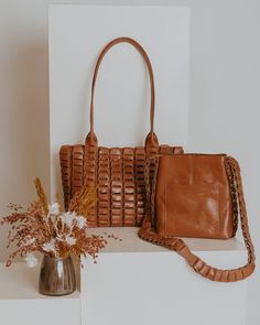 Smooth vegetable tanned leather bag, in tobacco. Construction with no stitching! Snap closure. Handle drop: 32cm High: 21cm / 8.2´ Lenght: 35cm / 13.7´ Depth: 8cm / 3.1´ Brown Leather Bucket Bag With Intrecciato Weave, Cognac Woven Leather Tote Shoulder Bag, Cognac Woven Leather Shoulder Bag For Everyday, Everyday Cognac Woven Leather Shoulder Bag, Cognac Leather Shoulder Bag With Woven Detail, Cognac Tote Shoulder Bag With Braided Handles, Everyday Brown Woven Leather Shoulder Bag, Cognac Woven Leather Bag For Everyday Use, Everyday Cognac Woven Leather Bag