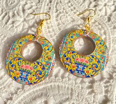 Handmade Persian earrings, It is popular with women of all ages and therefore makes a great gift for mothers, daughters, wives, or girlfriends. Especially for a Persian girl or the one who like history and traditional architecture. the motives inspired from Persian architecture. earring diameter 4 cm. earring height 7 cm. The creation of Persian tiles began about 1200 A.D. and Persian tiles decorating reached it's zenith in the 18th and 19th centuries. Simply put, Persia has the most beautiful t Colorful Dangle Earrings For Gift, Colorful Earrings As A Gift, Handmade Multicolor Jewelry For Mother's Day, Colorful Circular Jewelry As Gift, Bohemian Colorful Earrings For Gift, Multicolor Circle Jewelry As Gift, Multicolor Circular Jewelry Gift, Colorful Round Earrings Gift, Colorful Round Earrings For Gift