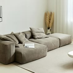 a living room with a large sectional couch