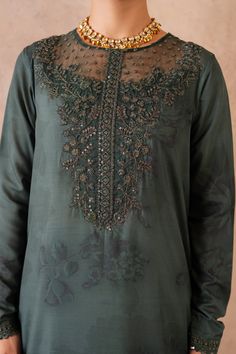 Shirt: Printed Raw SilkNeckline: Embroidered OrganzaFront, Back, Chalk & Sleeves Lace: Embroidered Organza (5.75 M)Dupatta: Embroidered Organza(2.5 M)Pallu Lace: Embroidered Organza(2.5 M)Trouser: Dyed Raw Silk (2.5 M) Eid Long Sleeve Sets With Embroidered Neckline, Eid Sets With Embroidered Neckline And Long Sleeves, Green Long Sleeve Top With Intricate Embroidery, Long Sleeve Sets With Embroidered Neckline For Eid, Traditional Long Sleeve Set With Embroidered Neckline, Silk Kurta With Embroidered Neckline And Long Sleeves, Festive Traditional Tops With Tonal Embroidery, Traditional Tops With Tonal Embroidery For Festive Occasions, Multicolor Embroidered Kurta With Long Sleeves