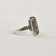 925 sterling silver Finger size US 7.5* Made from vintage methods and instruments in recycled gold by Hugo Kohl and team in his Harrisonburg, VA studio. *This ring can be re-sized to sizes ranged 5-8 For an additional $20. If you would like to have this ring sized please send us a message. About Hugo Kohl Hugo Kohl's Harrisonburg, VA workshop utilizes one of the worlds' largest collections of antique jewelry dies, hubs, and rolls from the iconic early industrial age to make expert vintage reprod Classic Sterling Silver Engraved Ring With Open Band, Classic Sterling Silver Engraved Open Band Ring, Antique Sterling Silver Engraved Signet Ring, Antique Engraved Sterling Silver Signet Ring, Antique Adjustable Etched Ring, Antique Adjustable Etched Rings, Antique Silver Engraved Open Ring, Antique Sterling Silver Signet Ring For Formal Occasions, Silver Etched Signet Ring