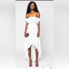 We're Loving The Weather And The Akira Label Days Like These Maxi Dress With Ruffles! This Dress Is Made From A Light White Fabrication, And Is Complete With A Ruffled Chest, Maxi Length, And A High Low Ruffled Hemline. Style This Dress With A Pair Of Platform Sandals, And A Woven Handbag! - 65% Cotton 35% Polyester - Hand Wash Cold- 31"- 51" Shoulder To Hem(Approx. Measured From Small)- Model Is Wearing Size Small- Importedproduct Id: 263335 -Nwt Sleeveless White Maxi Dress With Ruffled Skirt, White Maxi Length Dress With Ruffled Skirt, White Ruffled Maxi Length Dress, White Ruffled Midi Dress For Spring, White Ruffled Skirt Dress For Date Night, White Dress With Ruffled Skirt For Date Night, White Fitted Ruffle Dress For Summer, White Flirty Ruffle Dress With Ruffled Skirt, White Flirty Ruffle Dress