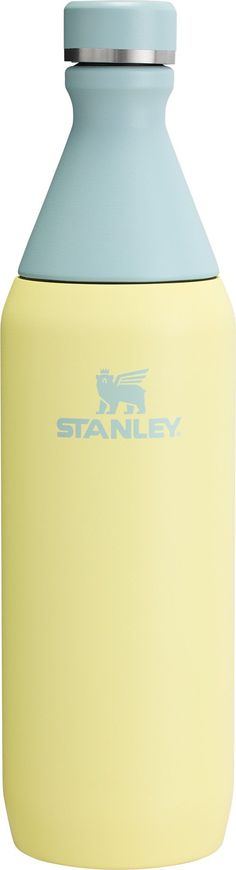 a yellow and blue water bottle sitting on top of a white surface