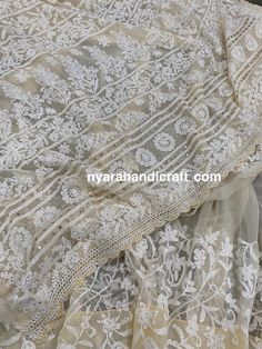 "Soft beige Chikankari georgette saree with hand embroidery and delicate gold \"Mukaish\" add ons and crochet lace. Heavy palla and broad border all along the body. Flowy sheer fabric! Includes an embroidered blouse piece too. Fall attached and petticoat included" Cream Saree With Intricate Embroidery For Festivals, Semi-stitched Salwar Kameez With Lace Work, Cream Georgette Saree With Intricate Embroidery, Traditional Cream Saree With Intricate Embroidery, Cream Saree With Intricate Embroidery For Diwali, Diwali Cream Saree With Intricate Embroidery, Cream Cutdana Embroidered Saree Fabric, Cream Embroidered Cutdana Saree Fabric, Unstitched Cream Saree With Intricate Embroidery