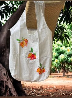 Best selling gift from Kaua'i Hawaii.  The farmers market tote shopping bags are super light weight cotton they fold up and fit in to the inside pocket which can also hold your money or credit card, I gave these out as gifts this year and they were such a huge hit I am adding these to my shop.  I am increasing the number of stamps on each bag as I repaint them.   Fabulous Kaua'i gift that won't break the bank.  Perfect bridesmaid gift - or holder for bridesmaids gifts for your Hawaii wedding. Eco-friendly Cotton Shoulder Bag For Summer, White Reusable Beach Bag For Daily Use, Casual Reusable Canvas Bag For Summer, Summer Cotton Beach Bag For Daily Use, Summer Cotton Beach Bag For Everyday Use, Eco-friendly Cotton Beach Bag For Summer, Summer Cotton Shoulder Bag For Daily Use, Summer Cotton Bags For Daily Use, Summer Travel Reusable Canvas Bag