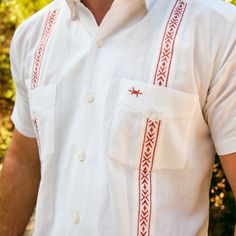 The Tejas Guayabera is the Texas Standard take on the popular south-of-the-border shirt of champions -- the guayabera. We've taken the lineage from our Standard Short Sleeve into our Tejas Guayabera, bringing along our hallmark features like a hidden button-down collar, untuckable length, and custom-cut feel, paired with the classic stylish side vents, detailed pocked embroidery, and double-breasted pocket. Our Tejas Guayaberas are made with a lightweight, breathable cotton/linen blend and are t Texas Man, Guayabera Shirt, Shirt Embroidery, University Of Texas, Leather Vest, Mens Shirt, Fishing Shirts, Pair Of Pants, Pocket Tee