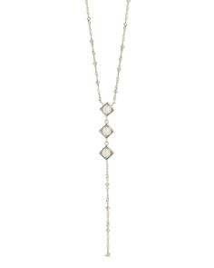 Introducing the Reine Lariat Necklace, a luxurious piece crafted for the sophisticated individual. This elegant necklace features a delicate beaded chain adorned with lustrous pearls, exuding an air of exclusivity and refinement. Elevate any outfit with the timeless style and grace of the Reine Lariat Necklace. Material: 14K gold or rhodium plated brass, freshwater pearls Features: Measures 16" with 2" extender, 3.75" drop, 0.35" pendants, 5mm pearls, 2mm chain, Lead & Nickel free, lobster clasp Lariat Necklace Silver, Pearl Lariat Necklace, Pearl Lariat, Elegant Necklace, Pearl Earrings Dangle, Elegant Necklaces, Style And Grace, Sterling Silver Hoops, Lariat Necklace