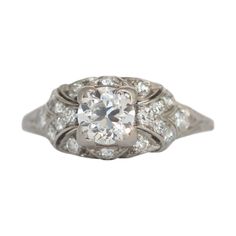 Ring Size: 7.75 Metal Type: Platinum [Hallmarked, and Tested] Weight: 3.5 grams Center Diamond Details: Weight: .68 carat Cut: Old European Brilliant Color: I Clarity: VS1 Side Diamond Details: Weight: .20 carat, total weight Cut: Antique Single Cut Color: F Clarity: VS Finger to Top of Stone Measurement: 4.5mm Condition: Excellent Luxury Gia Certified Diamond Ring With Round Stone, Luxury Gia Certified Round Diamond Ring, Collectible Platinum Rings With Brilliant Cut, Classic Platinum Cluster Ring With Baguette Cut, Gia Certified Luxury Diamond Ring For Collectors, Luxury Gia Certified Collectible Diamond Ring, Luxury Collectible Gia Certified Diamond Ring, Collectible Platinum Diamond Ring With Brilliant Cut, Collectible Platinum Diamond Ring In Diamond White