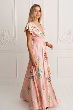 Iris Gown – Marina St Barth Pink Flowy V-neck Maxi Dress, Pink V-neck Gown For Spring, Feminine V-neck Gown For Spring, Feminine V-neck Spring Gown, Pink V-neck Summer Gown, Summer Pink V-neck Gown, Pink Floor-length Dress With Floral Embroidery, Pink V-neck Maxi Dress With Ruffles, Pink Floral Embroidered Floor-length Dress