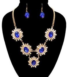 Gold metal chain necklace set with royal blue and clear stones flower pendants. Lobster clasp closure Metal Chain Necklace, Flower Pendant Necklace, Blue Jewelry, Large Earrings, Blue Rhinestones, Rhinestone Necklace, Flower Pendant, Wholesale Jewelry, Metal Chain