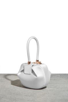 Satin Demi Bag by Gabriela Hearst High-end Formal Bags With Top Carry Handle, Designer White Bucket Bag With Top Carry Handle, High-end White Double Handle Bag, High-end Formal Top Handle Bag, High-end Top Handle Bag For Formal Occasions, High-end Evening Bag With Top Carry Handle, Luxury White Bucket Bag With Top Carry Handle, Luxury White Bucket Bag With Top Handle, Luxury Pouch Box Bag With Top Carry Handle