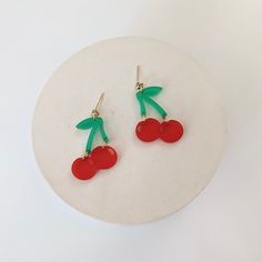 Cherry earrings are perfect for summer! gold plated stud posts acrylic 1.5 in x 1 in Trendy Adjustable Drop Clip-on Earrings, Trendy Adjustable Nickel-free Earrings, Trendy Nickel-free Dangle Clip-on Earrings, Trendy Dangle Plug Earrings, Nickel Free, Trendy Dangle Clip-on Earrings With Ear Wire, Trendy Nickel-free Drop Plug Earrings, Trendy Nickel-free Dangle Plug Earrings, Trendy Adjustable Earrings, Fun Red Resin Earrings