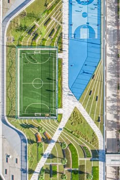 an aerial view of a soccer field in the city