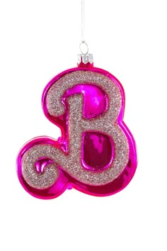 a pink ornament with the letter b on it's front and bottom