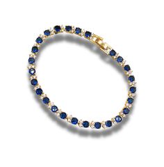 Discover the elegance of our Sapphire Round-Cut Tennis Bracelet, beautifully presented in a luxurious gift box. This exquisite bracelet features stunning round-cut sapphires, each meticulously set to create a timeless and sophisticated design perfect for any occasion. Care Instructions: Avoid exposure to harsh chemicals and store it in the provided gift box when not in use to maintain its shine. Clean gently with a soft cloth to preserve the brilliance of the sapphires. Why You'll Love It: The v Elegant Blue Jewelry For Birthday Gift, Elegant Tennis Bracelet With Sparkling Stones For Gift, Cubic Zirconia Jubilee Tennis Bracelet Gift, Elegant Crystal Bracelet With Sparkling Stones For Gift, Cubic Zirconia Tennis Bracelet With Jubilee Design, Classic Tennis Bracelet With Sparkling Stones As Gift, Luxury Crystal Jubilee Bracelet Gift, Cubic Zirconia Crystal Bracelet Gift, Luxury Jubilee Crystal Bracelet As Gift