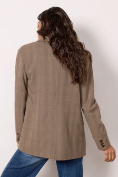 Feel chic from office to evening in this blazer by BlankNYC, featuring a single-breasted silhouette with two front button closures, padded shoulders, and notched lapels. Layer with any look from trousers to shorts to wide-leg jeans. | BLANKNYC Women's Business Affair Blazer, Size XS, Brown