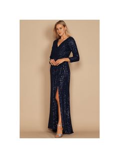 This elegant long sleeve dress has a deep V-neckline and a full back. In order to give it a sparkly appearance, sequined beads have been added. It is the ideal choice for significant occasions where you want to appear classy and clever while wearing something unusual due to the high slit that blends with the train and showcases the silhouette.






Fabric : Sequins

Length : Approximately 59 inches

Sleeve Style : Long Sleeve

Fully Lined

Occasion : Formal, Prom, Homecoming, Wedding Guest, Red Fitted V-neck Sequin Fabric For Evening, Embellished V-neck Maxi Dress For Gala, V-neck Sequin Dress For Gala And Party Season, Long Sleeve Embellished Maxi Dress For Formal Events, Embellished Long Sleeve Maxi Dress For Formal Occasions, Embellished Long Sleeve Maxi Dress For Formal Events, Holiday V-neck Embellished Sequin Dress, Fitted V-neck Sequin Fabric For Prom, Formal V-neck Sequin Dress For Gala