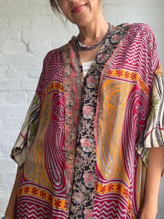 This is patchwork, silk kimono shirt made for men and ladies perfect colorful outfit in modern hippy boho style very comfortable and flowey Great outfit for summer days and nights made free size  more available at  https://www.etsy.com/shop/AltheaStores? Thank you for looking Multicolor Boho Print Kimono For Festival, Hippie Multicolor Kaftan With Kimono Sleeves, Multicolor Tunic Kimono For Festival, Multicolor Boho Print Free Size Kimono, Multicolor Free Size Boho Print Kimono, Hippie Multicolor Kimono With Kimono Sleeves, Multicolor Hippie Kimono With Kimono Sleeves, Bohemian Style Relaxed Fit Kimono For Festival, Bohemian Kimono Relaxed Fit For Festival