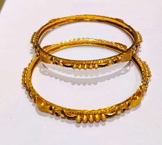 22K Real Solid GOLD Bangle - Indian Style Bangles - Real Solid Gold handcrafted bangle- Gift for wife An elegant and sophisticated personalized bangles with alot of tiny details. Modern touch with Indian heritage look. This item has been handmade and it took me around 30 days to get the final product. PRODUCT SPECIFICATION: Material: Real Solid 22K Gold ( HALLMARKED) Design: Indian Karigiri Weight: 4 pcs is 48 grams approx Width: 8mm Theme: Indian Gokhru design Size: We will make your size ( Mes Solid Gold Bangle, Gold Bangles Indian, Bangles Indian, Indian Heritage, Gold Bangle, Bangle Set, Indian Style, Pure Gold, Gift For Wife