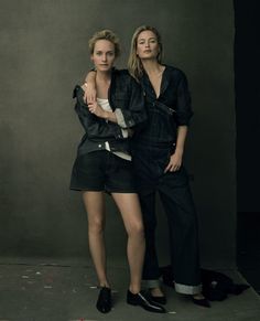 two women standing next to each other in front of a gray background with the words ambrevalgetta on it