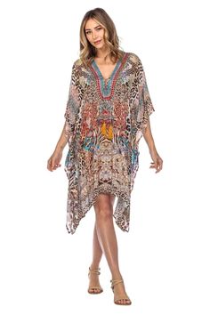 Lightweight Viscose Silk with colorful digital print and decorative rhinestones. Care: Hand wash cold, hang dry, iron from reverse if needed. The perfect La Moda Kaftan Resort Wear top, flowy and super light. It will keep you fresh and looking beautiful in warm weather! Wear it over swimsuit or as regular top. Made with lightweight material, roomy with a relax fit. This caftan top features a deep lace up V neck, generous armholes and fine embellishing.It has an elegant cape like drape. Its uniqu Multicolor V-neck Kaftan With Digital Print, Summer V-neck Kaftan With Digital Print, Multicolor V-neck Party Swimwear, Multicolor Digital Print Dress For The Beach, Multicolor Digital Print Beach Dress, Beach Dress With Multicolor Digital Print, Embellished Swimwear For Summer Pool, Embellished Swimwear For Summer Pool Season, Embellished Swimwear For Pool And Summer