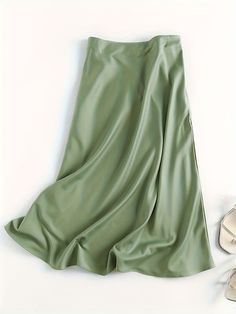 Solid Retro Chic Vintage Satin High Waist Maxi Dress Hey there, fashion-forward babes! Ready to level up your wardrobe game? These Retro Satin Maxi Skirts are an absolute must-have for anyone who wants to rock retro vibes in style. Whether you're chilling at the beach, hitting up a music festival, or simply strolling around the city, these skirts will have you turning heads and slaying the fashion game effortlessly. Made from 100% polyester material, these skirts are designed to keep you feeling comfy and cool all day long. With their high waist design and solid color pattern, they offer endless styling possibilities. Pair them with any top or crop, and you've got yourself a killer outfit for any occasion. But it doesn't stop there, babes! These skirts are made with non-stretch woven fabri Casual Non-stretch Skirt For Spring, Trendy Non-stretch Skirt For Spring, Chic Solid Color Skirt For Spring, Elegant Green Summer Skirt, Trendy Solid Color Summer Skirt, Fitted Casual Skirt In Solid Color, Casual Fitted Skirt In Solid Color, Fitted Solid Color Skirt For Spring, Casual Fitted Solid Color Skirt