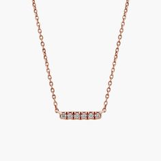 Versatile elegance for everyday wear, this mini bar-style necklace presents six round-cut diamonds set in rich 14k rose gold on a cable chain for slip-on-and-go simplicity. This necklace can be worn at 16 or 18 inches for added versatility. Minimalist Rose Gold Diamond Necklace With Adjustable Chain, Gold Bar Necklace With Single Cut Diamonds As Gift, Minimalist Rose Gold Bar Necklace For Everyday, Personalized Rose Gold Bar Necklace As Gift, Minimalist Rose Gold Diamond Charm Necklace, Diamond Bar Necklace, Bar Styling, Diamond Bar, Blue Nile