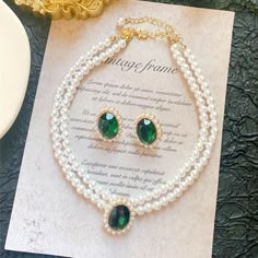 pearl-necklace-and-earring-set-multi-strand-pearl-necklace-emerald-stud-earrings-in-a-jewelry-set Bride Pearl Necklace, Pearl Necklace And Earring Set, Multi Strand Pearl Necklace, Emerald Stud Earrings, Inexpensive Jewelry, Necklace Emerald, Pearl Necklace Vintage, Emerald Earrings Studs, Bride Earrings