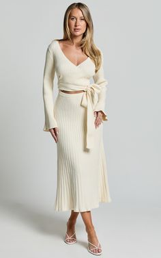 Andreia Midi Dress - Knitted Wrap Long Sleeve Dress in Cream | Showpo USA Chic Beige Midi Length Sweater Dress, Chic Beige Ribbed Midi Dress, Elegant Sweater Dress For Spring Brunch, Elegant Cream V-neck Sweater Dress, Chic Beige Ribbed Sweater Dress, Cream Color Outfits For Women, Elegant Beige Midi Sweater Dress, Chic V-neck Sweater Dress For Brunch, Elegant Winter White Dress For Fall