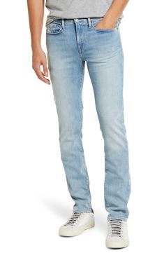 Faded and whiskered stretch denim gives a broken-in finish to casual-cool jeans cut slim through the hips for a modern profile. 32" inseam; 12" leg opening; 9" front rise; 13 1/2" back rise (size 29) Zip fly with button closure Five-pocket style 96% cotton, 3% elasterell-p, 1% elastane. Machine wash, tumble dry Imported Men's Clothing Fitted Flare Jeans In Faded Rigid Denim, Fitted Light Wash Jeans With Frayed Hem, Modern Light Wash Straight Leg Jeans, Light Wash Straight Fit Bottoms With Standard Cut Leg, Slim Fit Medium Wash Jeans, Light Wash Stretch Straight Leg Jeans, Medium Wash Slim Fit Jeans, Light Wash Stretch Jeans With Straight Leg, Light Wash Fitted Straight Jeans