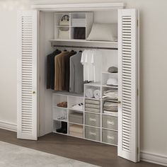 an open closet with white shutters and drawers