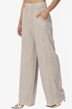 Discover the perfect blend of boho-chic and comfort with these Washed Linen Wide Leg Pants.Their elastic waistband and frayed hem offer a relaxed, yet stylish fit that moves with you.Crafted from a breathable linen blend, these versatile slacks are a must-have for effortless summer style.Dress them up for work or keep it casual for a weekend getaway. With slant pockets for convenience and a timeless wide-leg design, these full-length pants are ideal for every occasion.Trendy Wide Leg Pants: Capt Spring Relaxed Wide Leg Harem Pants, Casual Ankle-length Linen Bottoms, Bohemian Lounge Pants With Pockets, Bohemian Loungewear Pants With Pockets, Bohemian Straight Leg Pants For Vacation, Chic Wide-leg Pants With Frayed Hem, Relaxed Fit Ankle-length Bottoms For Vacation, Bohemian Spring Bottoms With Frayed Hem, Bohemian Bottoms With Frayed Hem For Spring