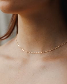 Light up your necklace stack with a glowing string of solid gold: a versatile, high-shine base for your favorite charms and pendants that you can put on…and leave on forever. Available in a 13-15” choker length or 15-17” pendant length for layering! 10k solid gold is:- more durable and scratch-resistant than 14k- made for a lifetime of 24/7 wear- nearly indistinguishable from 14k in color and shine- able to be polished and refinished indefinitely- waterproof and sweat-proof—just no chemicals, pl