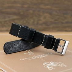 "At Cozy Handmade, we pride ourselves on using the highest quality materials for our products. This watch strap (NAT2) is made of premium full grain Italian veg tanned leather from one of the best tanneries in Italy. The leather features gorgeous texture and natural characteristics which will give your watch an instant rugged and vintage stylish look. Its appearance will get even better with time as it acquires patina, wrinkles and marks. This watch strap is designed to have no excess strap tail Leather Watch Accessories With Silver Buckle For Everyday Use, Leather Watch Accessories With Adjustable Strap For Everyday Use, Everyday Black Watch Accessories With Leather Strap, Leather Watch Band For Everyday Use, Everyday Black Watch With Leather Strap, Everyday Leather Black Band Watch Accessories, Adjustable Vegetable Tanned Leather Watch Bands With Waxed Finish, Black Leather Strap Watch Accessories For Everyday, Everyday Black Watch Bands With Leather Strap