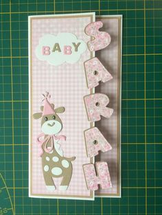 a baby's first birthday card with a giraffe and name on it