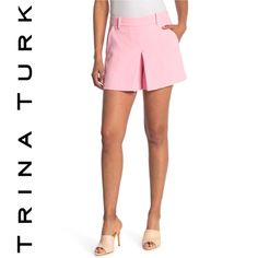 New With Tags Trina Turk Solar Shorts In Pink Size 6 - Refer To My Photos For Measurements An Overall Clean And Sleek Look. The High-Rise Short Features A Relaxed Hip And Thigh And Has A Slightly Flared Silhouette To This Modern Skort, A Shorts And Skirt Combo. Wear As A Weekend-Casual Look, Paired With A Tee, Or Dress It Up With A Silk Blouse And Heels For A Night Out. Belt Loop Waistband Concealed Side Zip Closure Inverted Front Pleat Side Slash Pockets Lined Inseam: 4", True To Size 100% Poly Chic Fitted Bermuda Shorts, Chic Above Knee Spring Bottoms, Spring Mini Shorts With Pockets, Spring Mini Bottoms For Workwear, Spring Workwear Mini Bottoms, Spring Mini Length Workwear Bottoms, Chic Mini Shorts With Pockets, Fitted Mini Length Shorts For Day Out, Chic Above-knee Spring Shorts