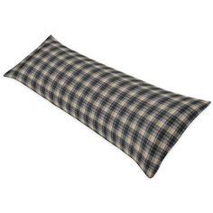 a black and tan plaid pillow on a white background