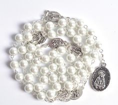 white chaplet catholic rosary, catholic rosary, white glass rosary, white seven sorrows rosary, winfinity brands - free shipping world wide White Spiritual Jewelry For Gifts, Customizable White Jewelry As A Gift, Customizable White Jewelry As Gifts, Customizable White Jewelry For Gift, Silver Beads Rosary As Gift, Adjustable White Rosary As Gift, Rosary With 8mm Round Beads As Gift, White Rosary For Mother's Day Gift, Adjustable Round Rosary As Gift