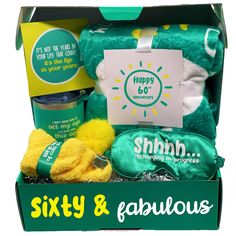 the sixty and fabulous gift box is filled with goodies for someone's special occasion